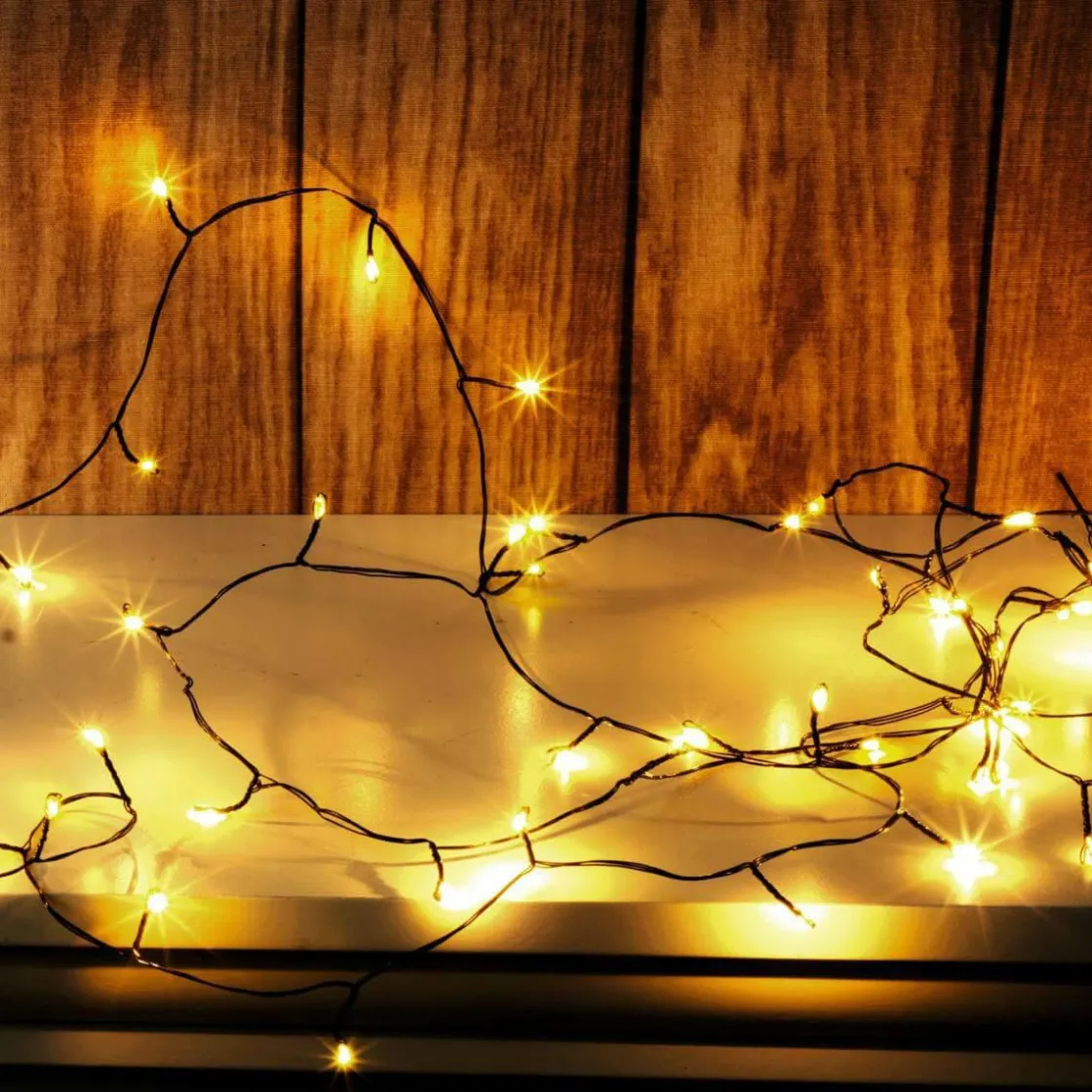 DecoWoerner Luces De Navidad>Cadena De Luces LED Twinkle Para Exterior, 10 M, Negra